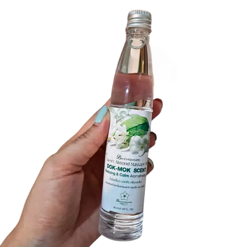 Mok Spa Massage Oil, light floral scent, cool scent like being in a wildflower when it blooms, size 90 ml.