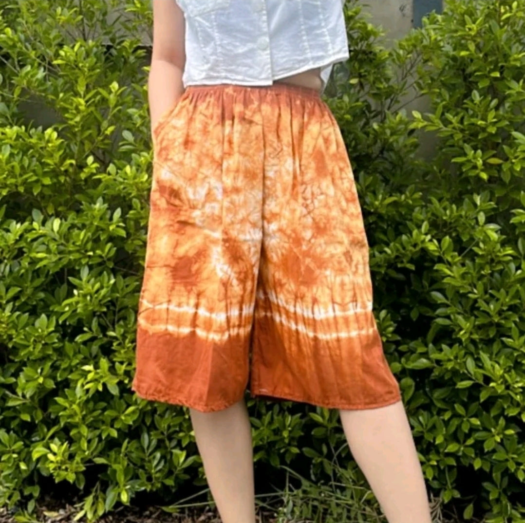 Tie-dye shorts, above the knee, waist 24-48 inches