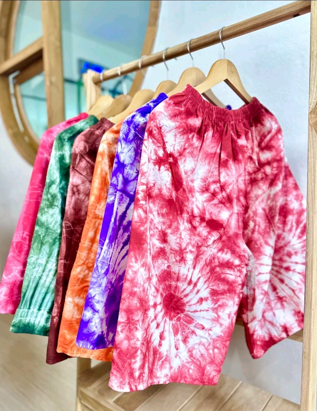 Tie-dye shorts, above the knee, waist 24-48 inches