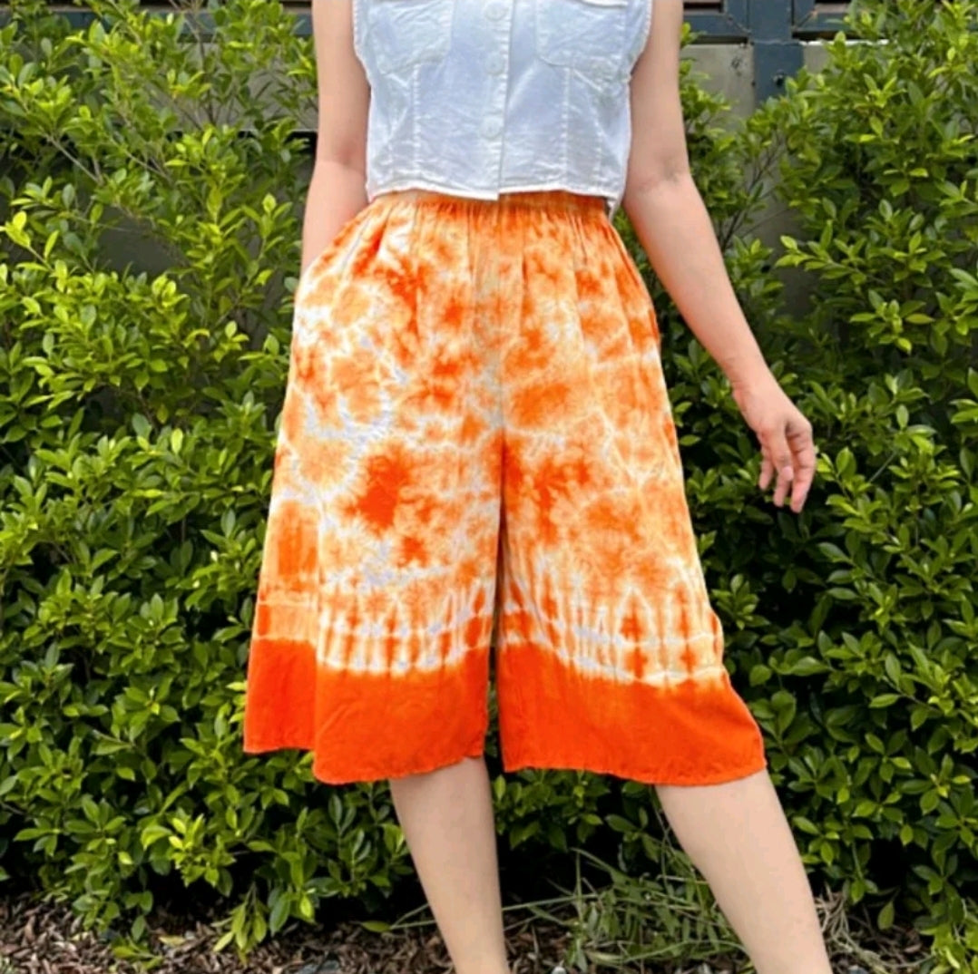 Tie-dye shorts, above the knee, waist 24-48 inches