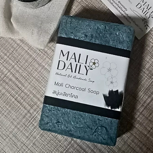 Handmade soap with natural oils, jasmine, charcoal, clean bath, fresh scent, relaxing.